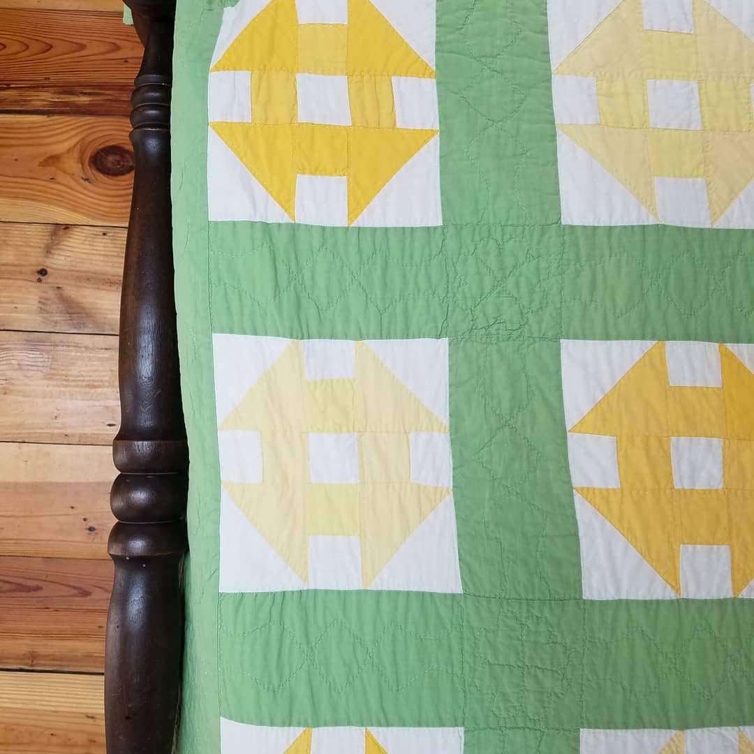 Green and Yellow Churn Dash Quilt