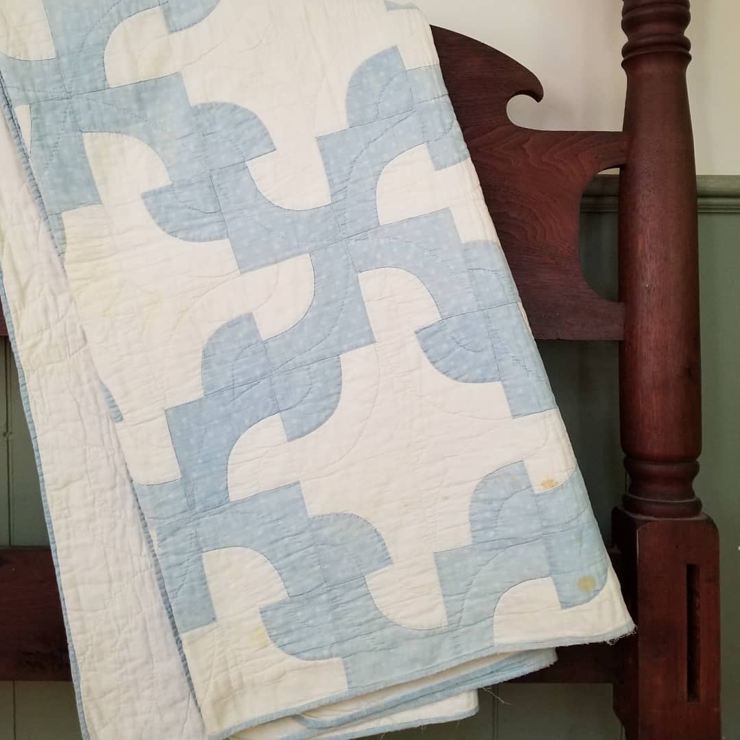 Blue and White Drunkard's Path Quilt.