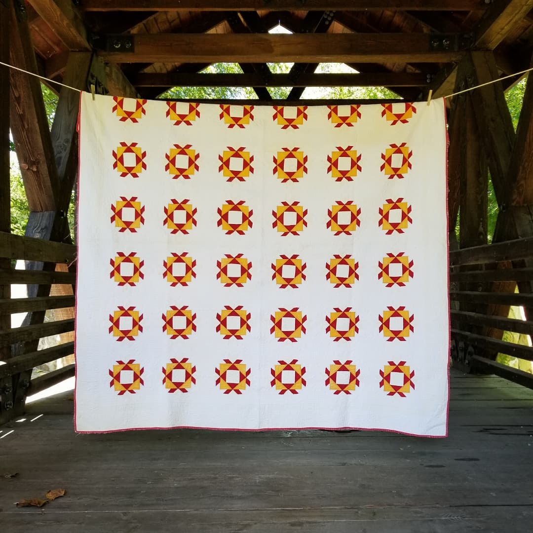 Red and Marigold Mosaic Quilt