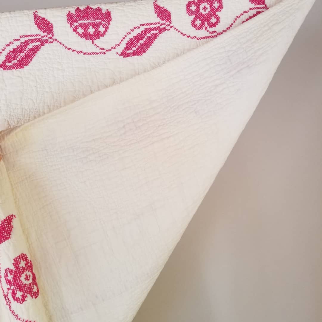 Fushia Cross Stitched Quilt