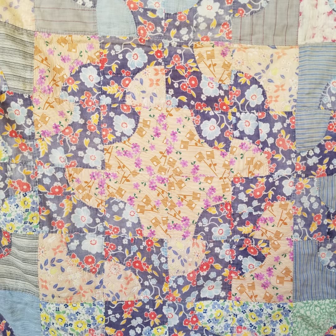 Floral Drunkard's Path Quilt