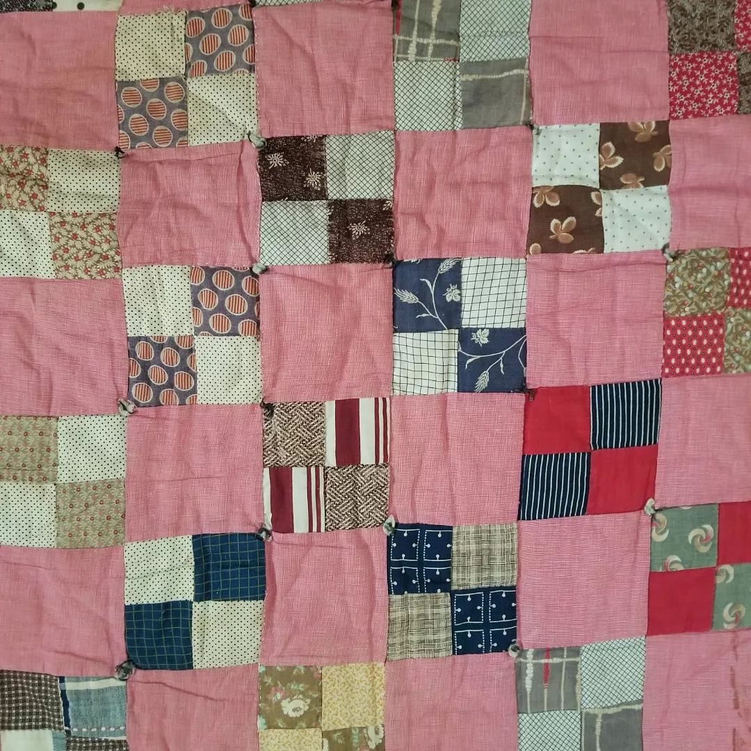 Four Patch Quilt with Newer Backing.