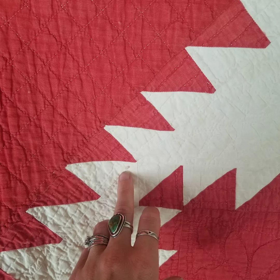 Red and White Sawtooth Quilt