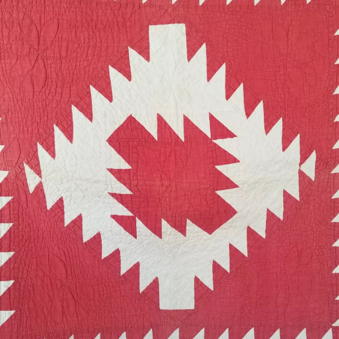 Red and White Sawtooth Quilt
