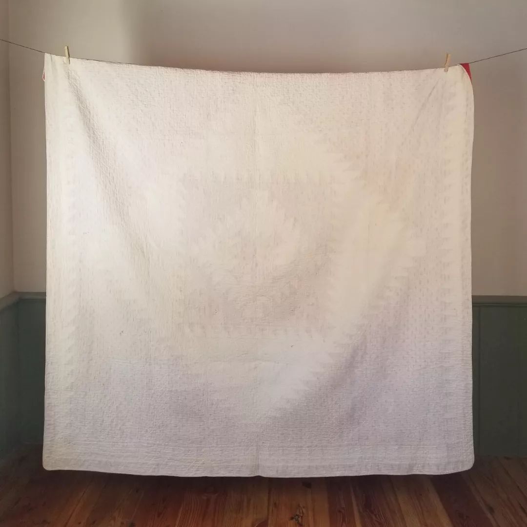 Red and White Sawtooth Quilt