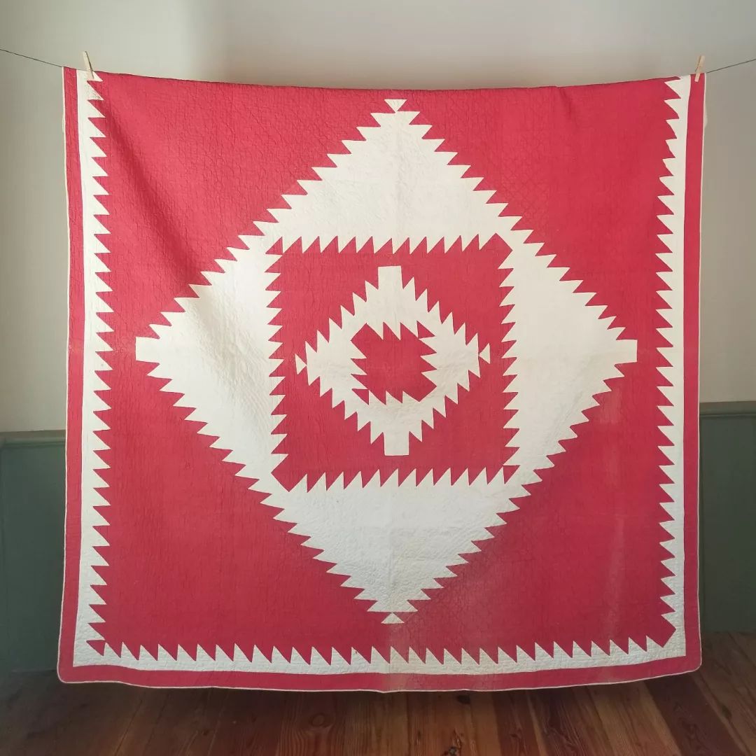 Red and White Sawtooth Quilt