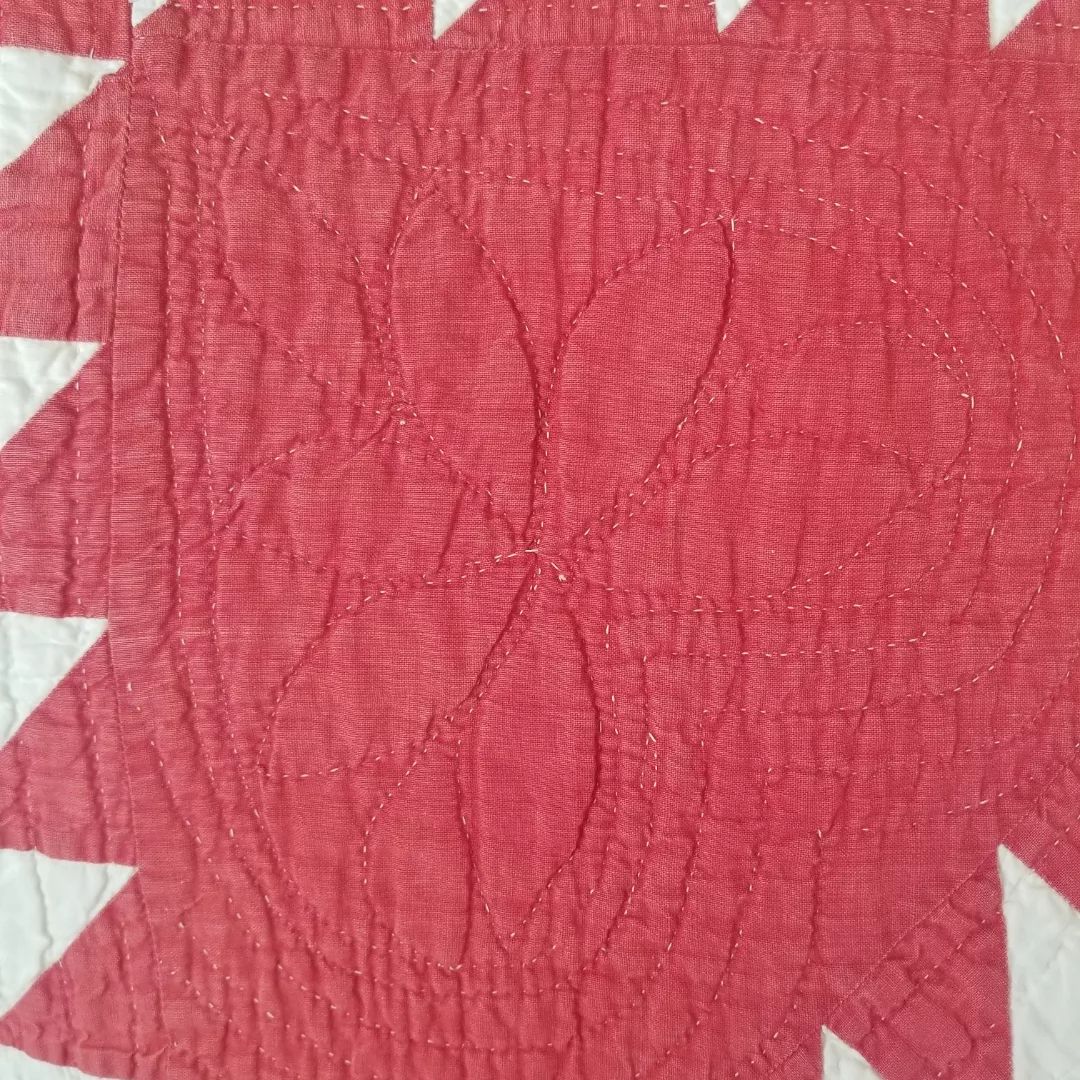 Red and White Sawtooth Quilt
