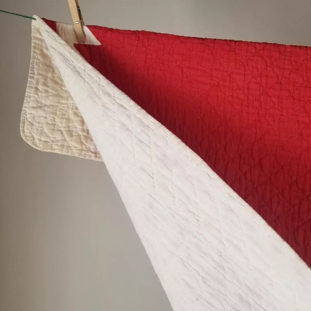 Red and White Sawtooth Quilt