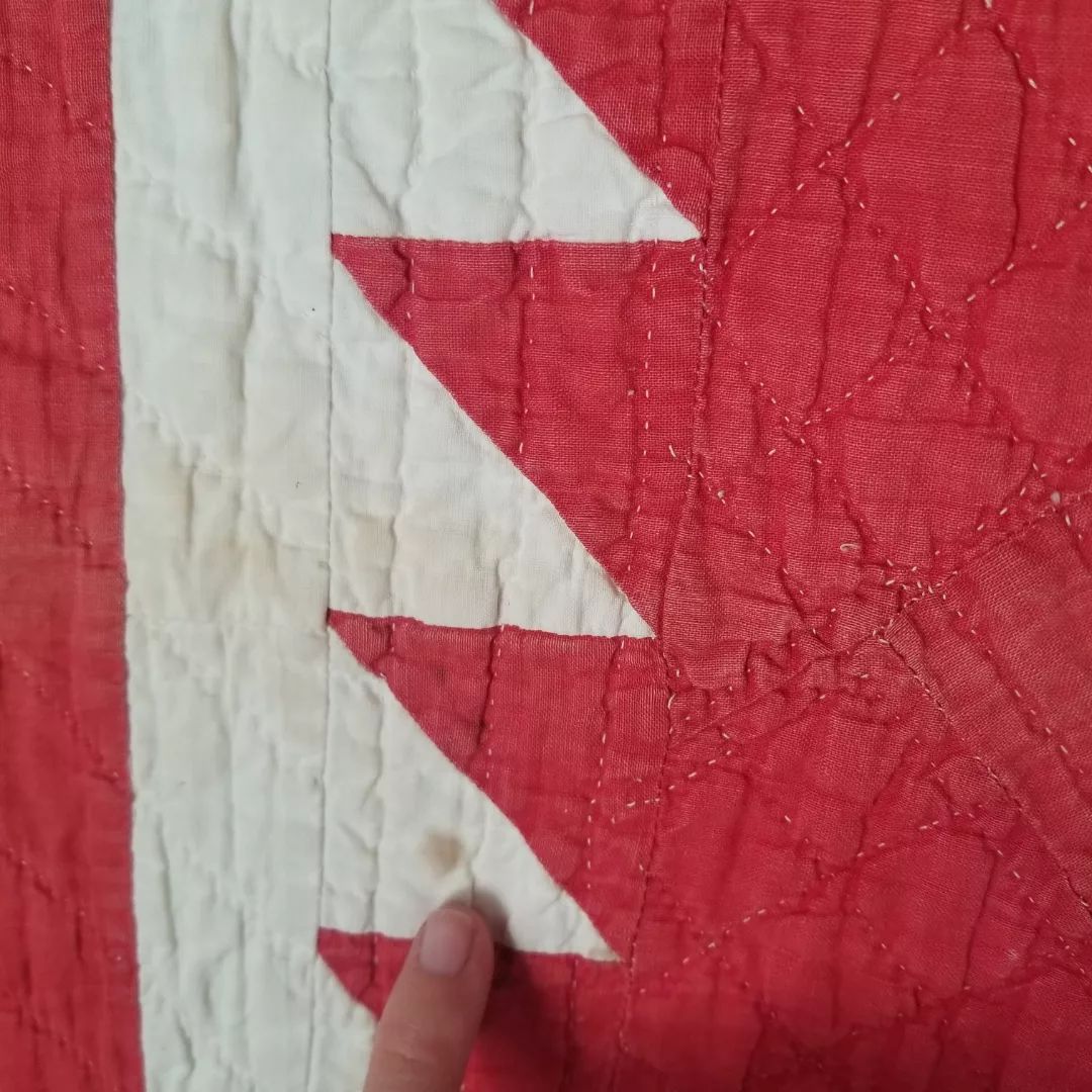 Red and White Sawtooth Quilt