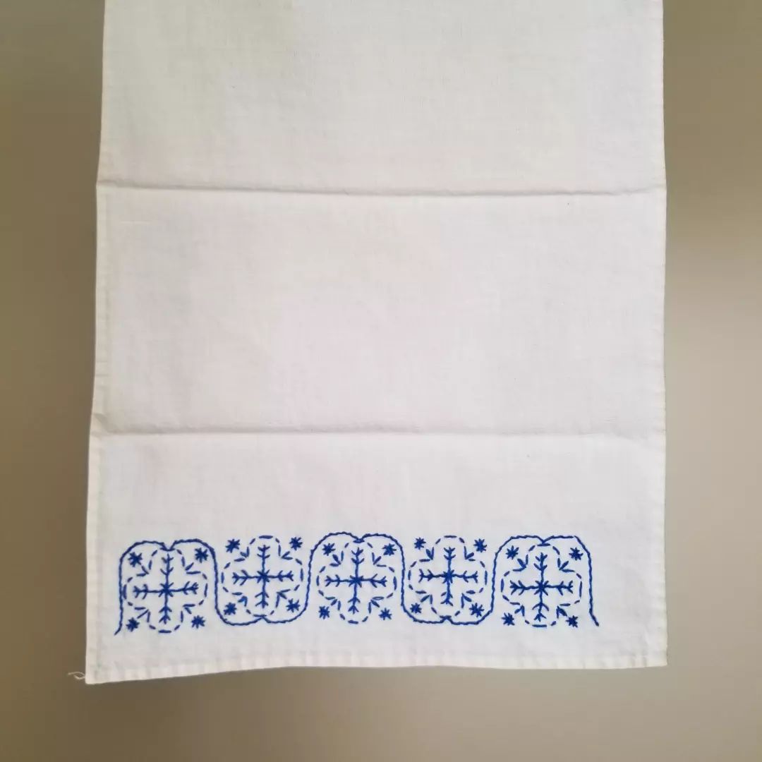 White & Blue Embroidered Cloth