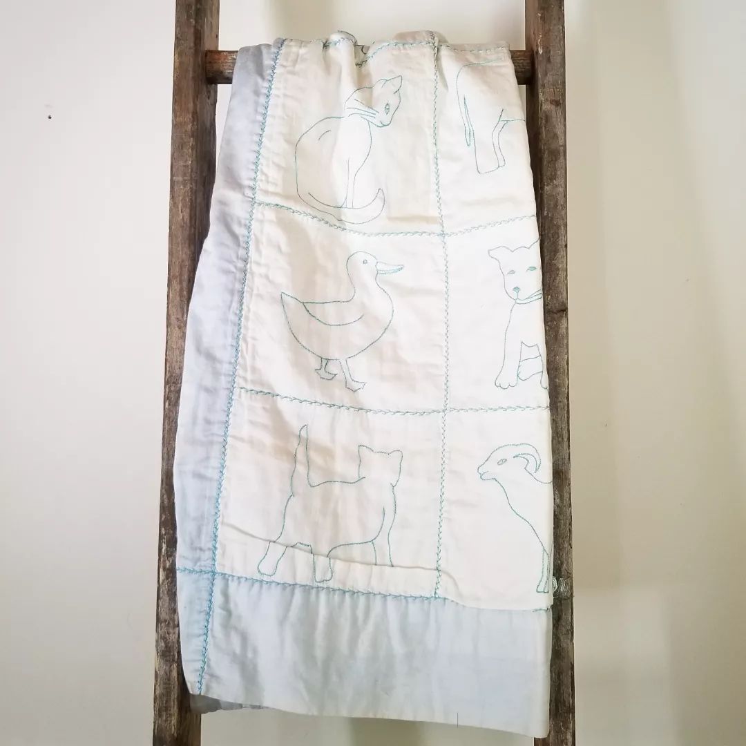 Embroidered Satin Baby Quilt