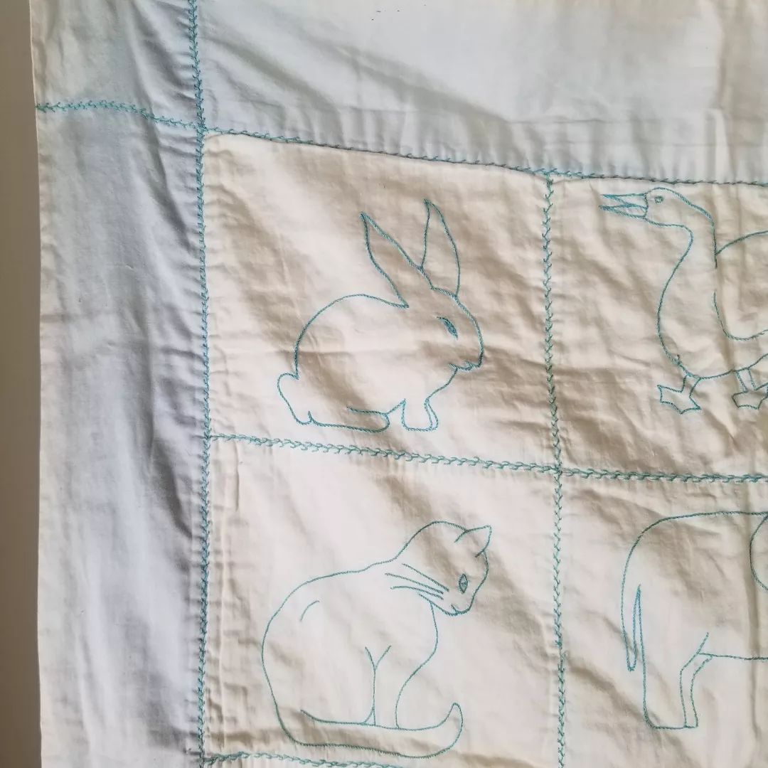 Embroidered Satin Baby Quilt