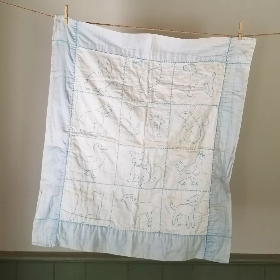 Embroidered Satin Baby Quilt