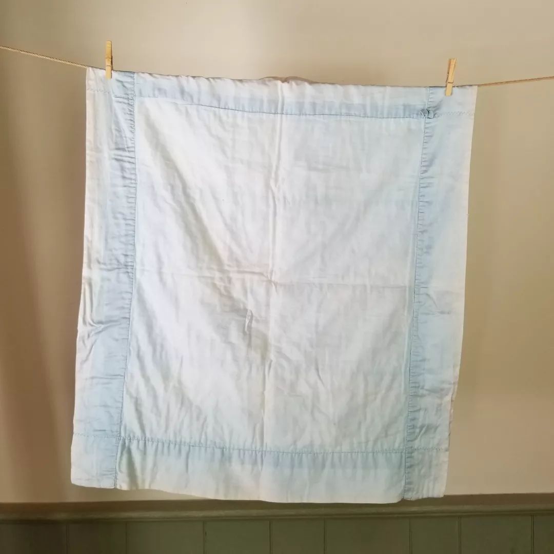 Embroidered Satin Baby Quilt