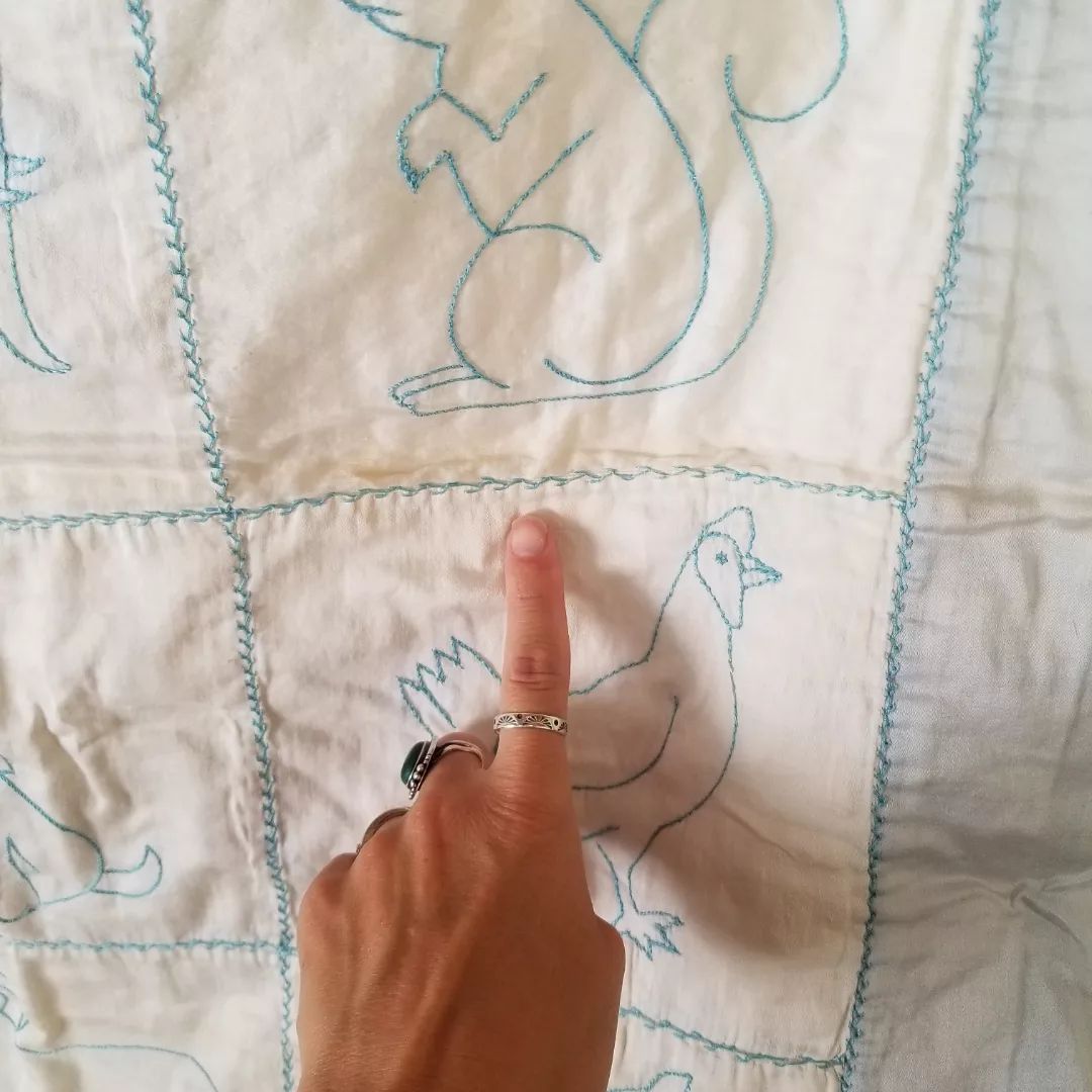 Embroidered Satin Baby Quilt