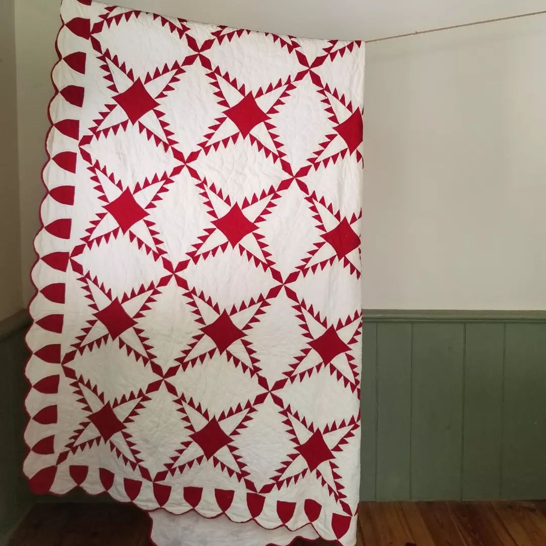 Red and White Feathered Star Quilt