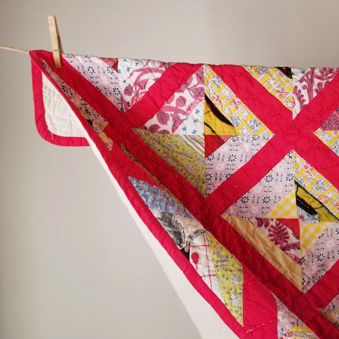 Red Sashed Scrappy Quilt