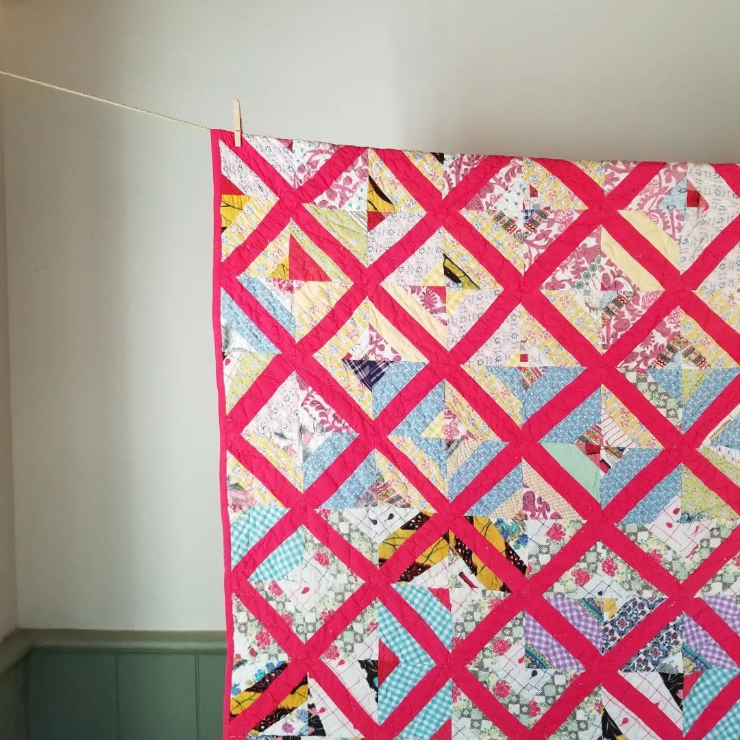 Red Sashed Scrappy Quilt