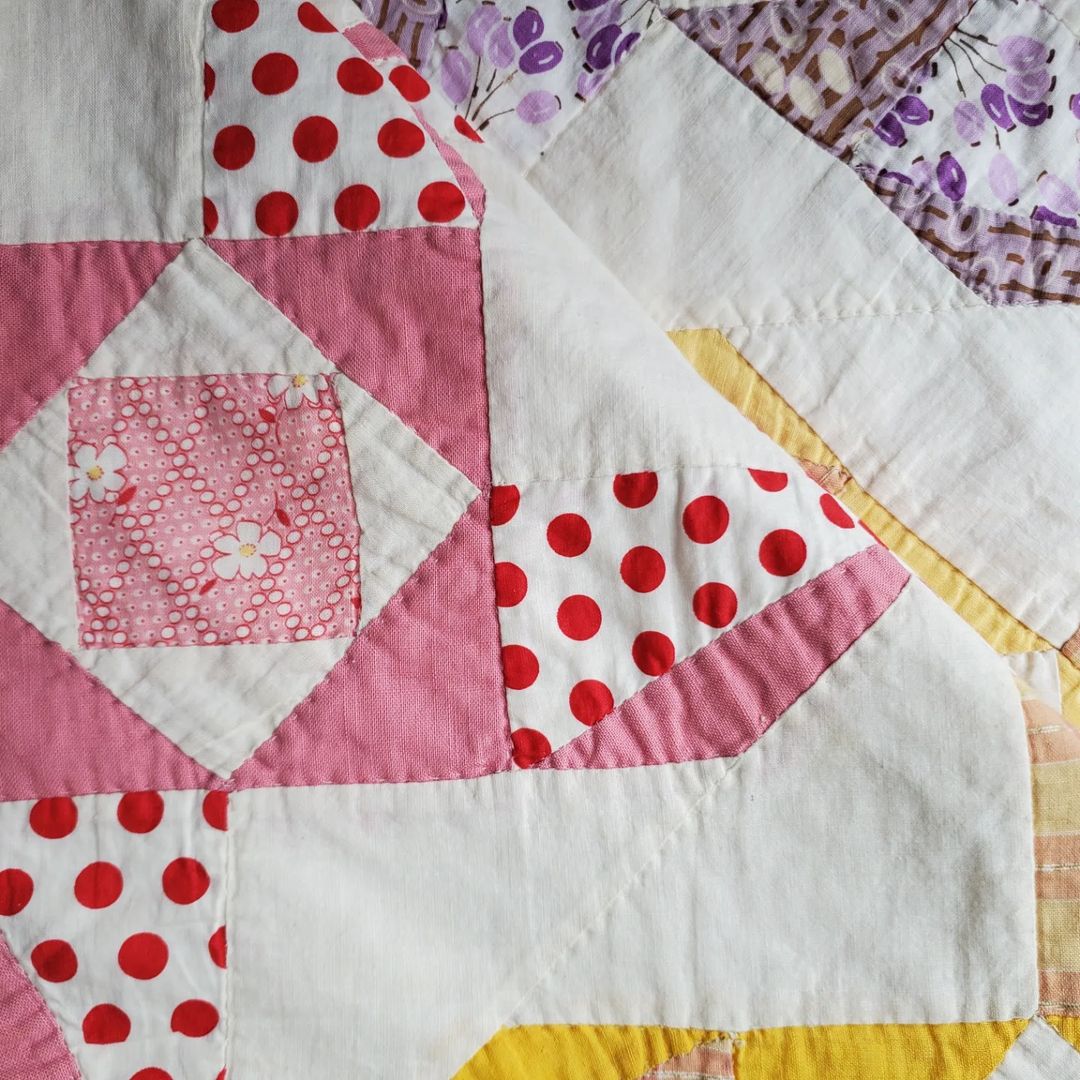 Rainbow Sacking Pinwheel Quilt