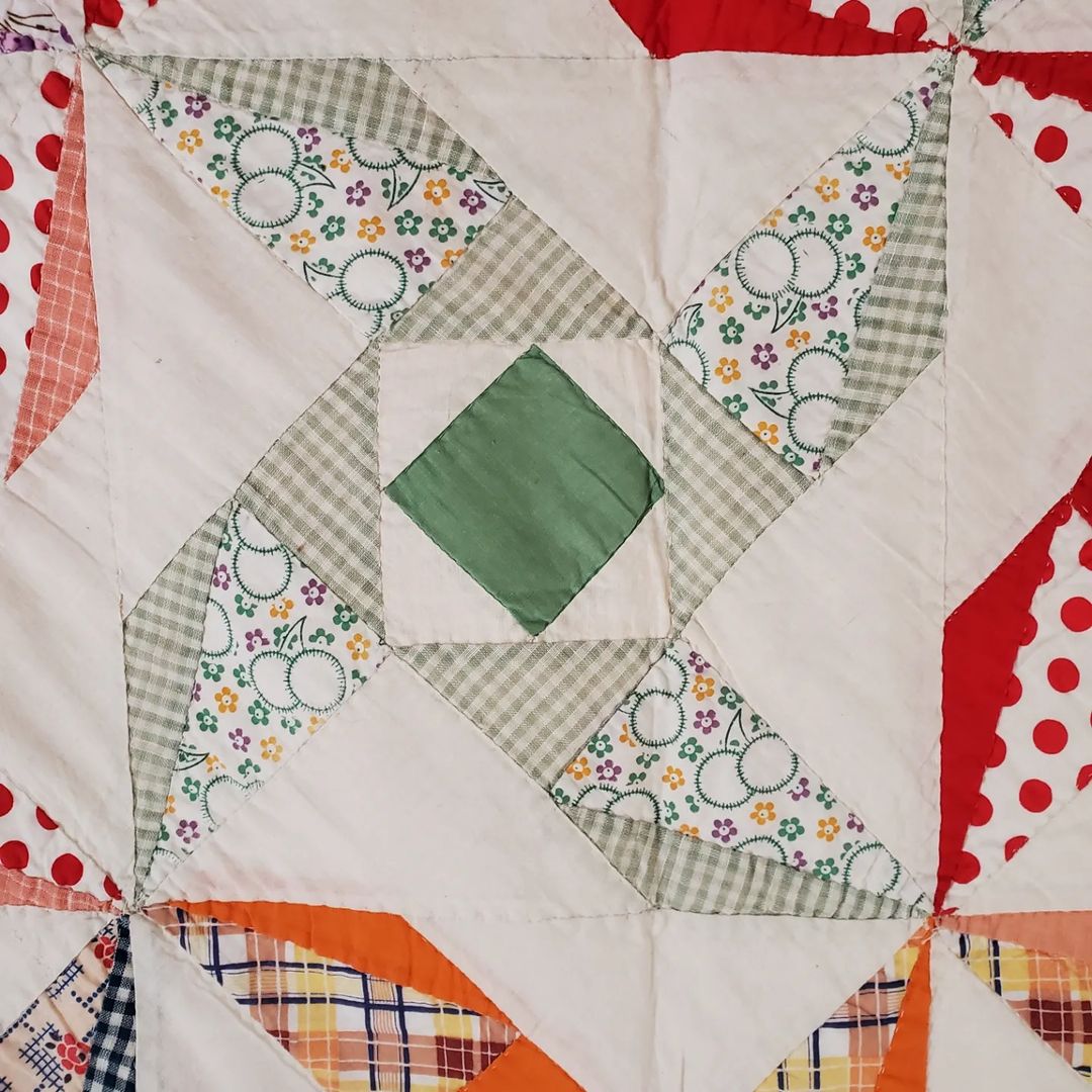 Rainbow Sacking Pinwheel Quilt