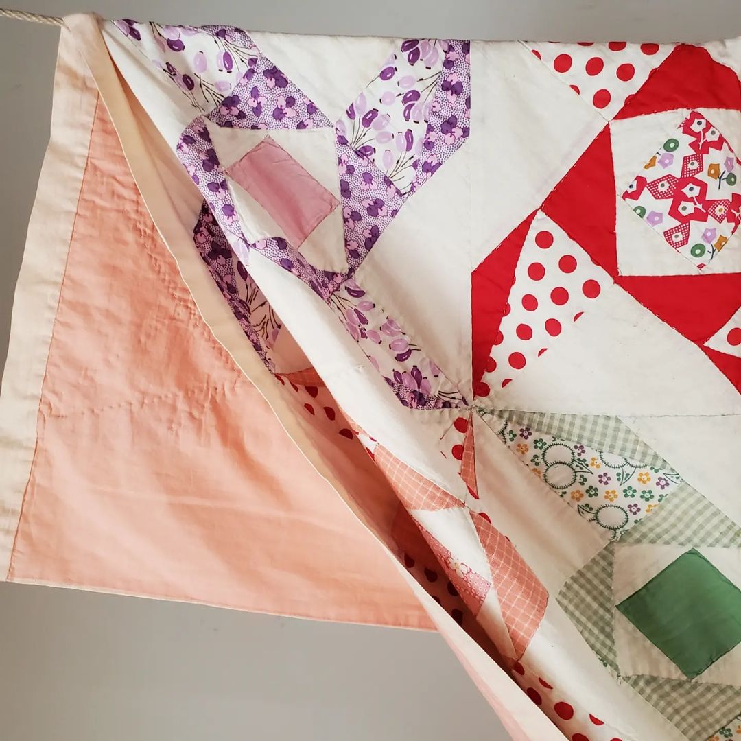 Rainbow Sacking Pinwheel Quilt