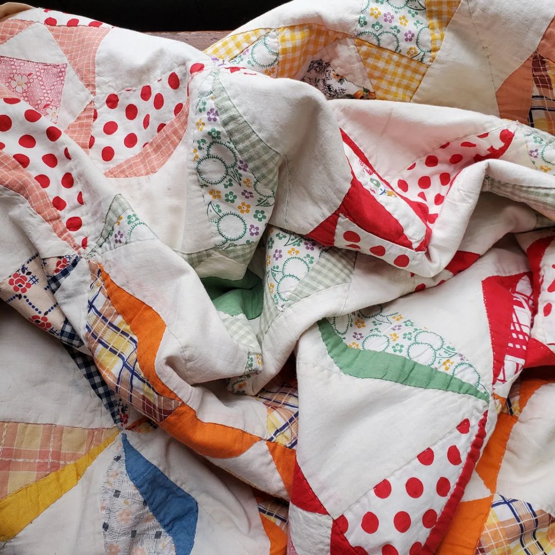Rainbow Sacking Pinwheel Quilt