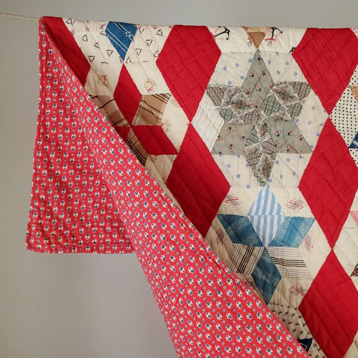 Early 20th Century Red White & Blue Star Quilt with Conversation Prints