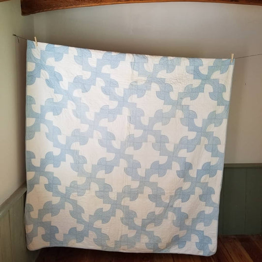 Blue and White Drunkard's Path Quilt.