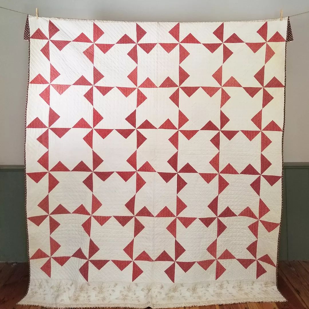 Red and Cream Pinwheel Quilt