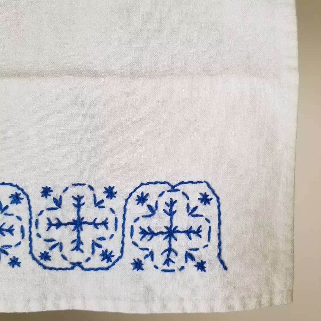 White & Blue Embroidered Cloth