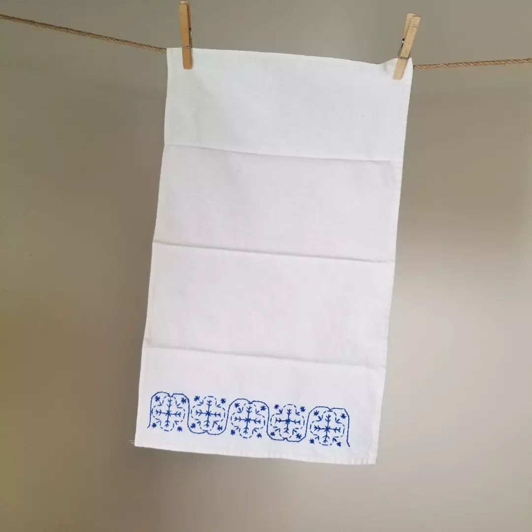 White & Blue Embroidered Cloth