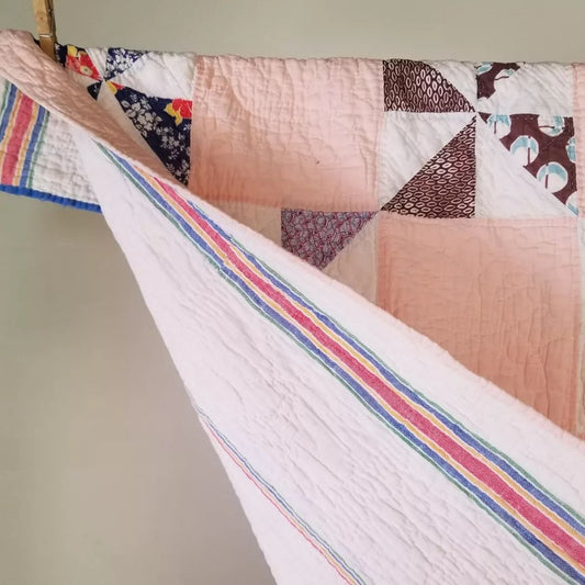 Soft Pink Pinwheel Quilt