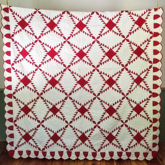 Red and White Feathered Star Quilt
