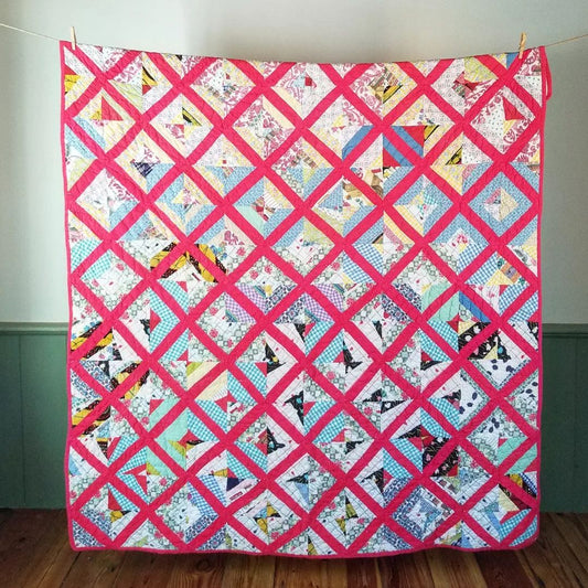 Red Sashed Scrappy Quilt