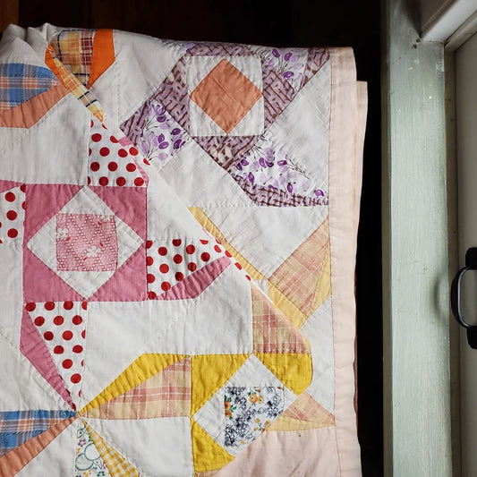 Rainbow Sacking Pinwheel Quilt