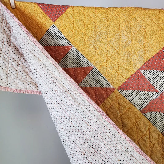 Cheddar Calico Quilt